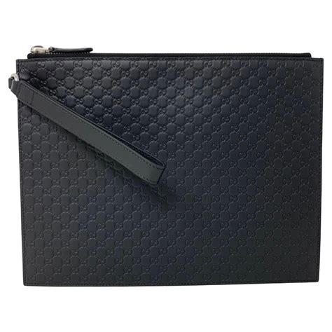 small black gucci clutch|Gucci guccissima clutch.